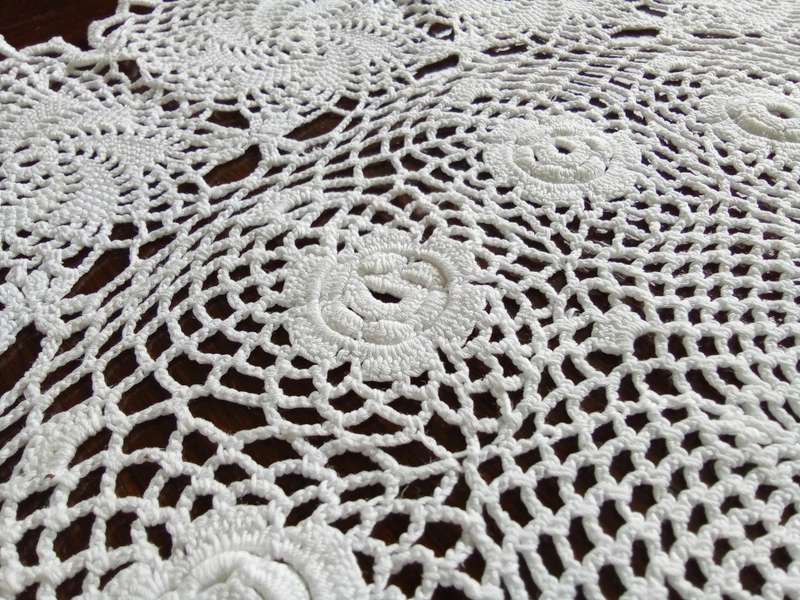 Stunning vintage white small crocheted tablecloth/large doily