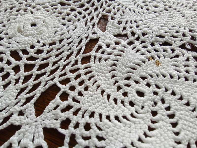 Stunning vintage white small crocheted tablecloth/large doily