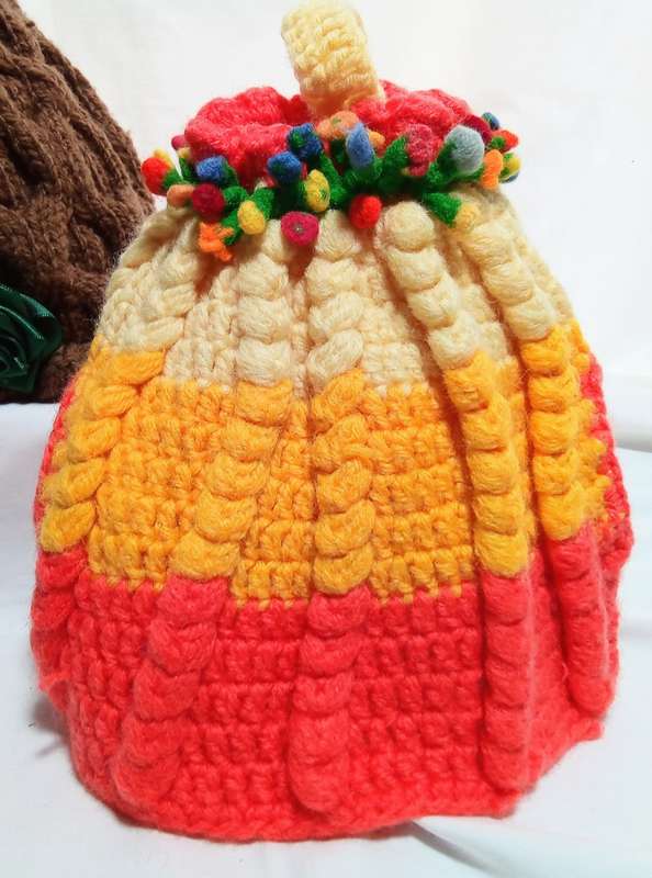 Two cute vintage tea cosies