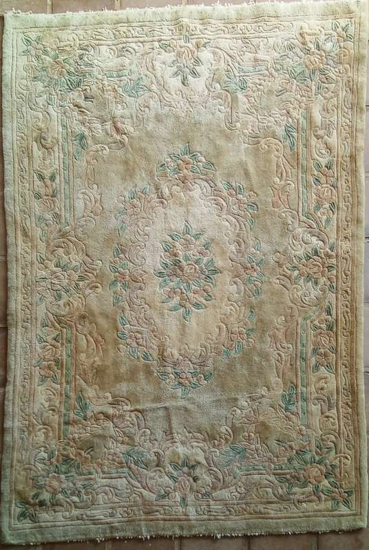 A lovely vintage (possibly antique) Chinese rug in muted colours (2.75x1.83m)
