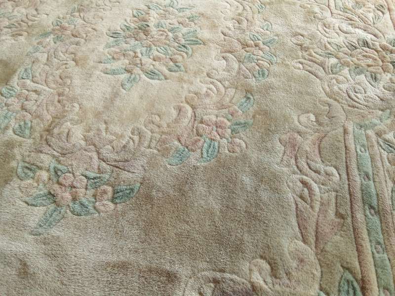A lovely vintage (possibly antique) Chinese rug in muted colours (2.75x1.83m)