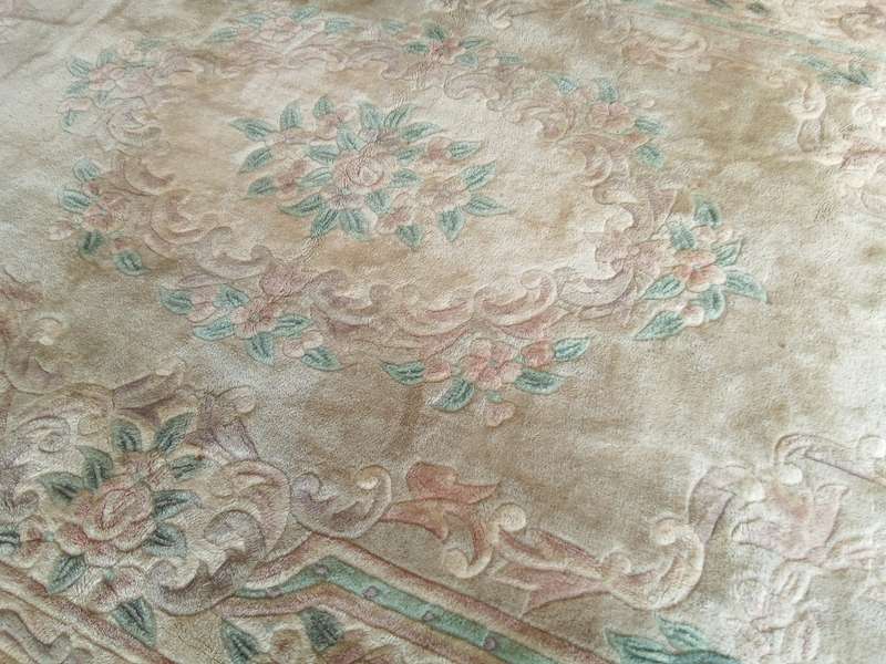 A lovely vintage (possibly antique) Chinese rug in muted colours (2.75x1.83m)