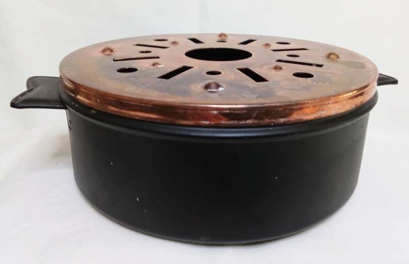 Vintage metal teapot warmer