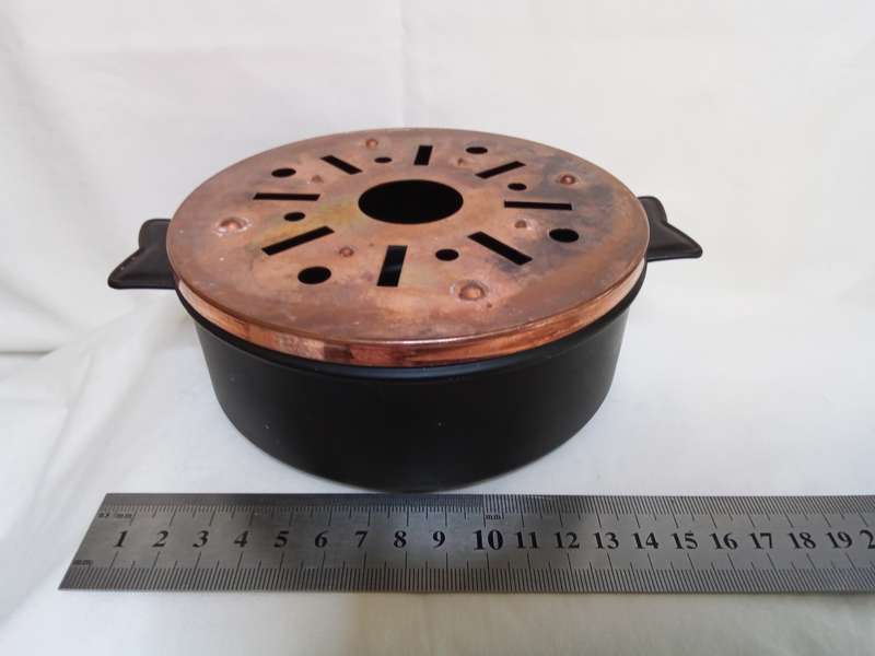 Vintage metal teapot warmer