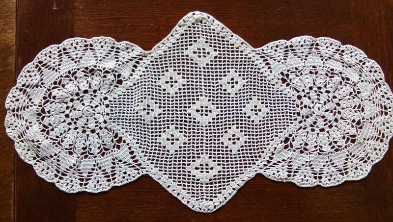 Pretty and unusual vintage crocheted doily