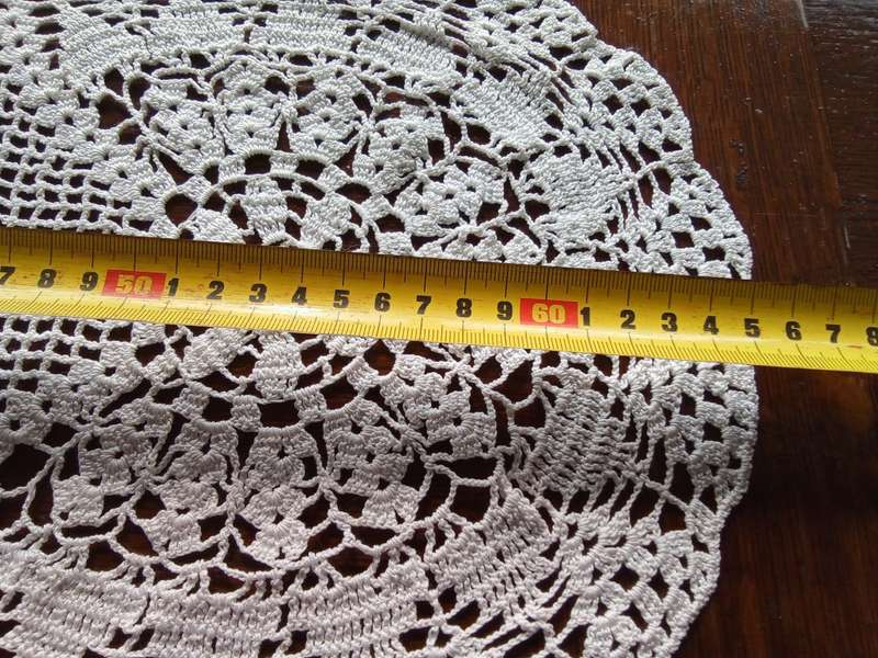 Pretty and unusual vintage crocheted doily