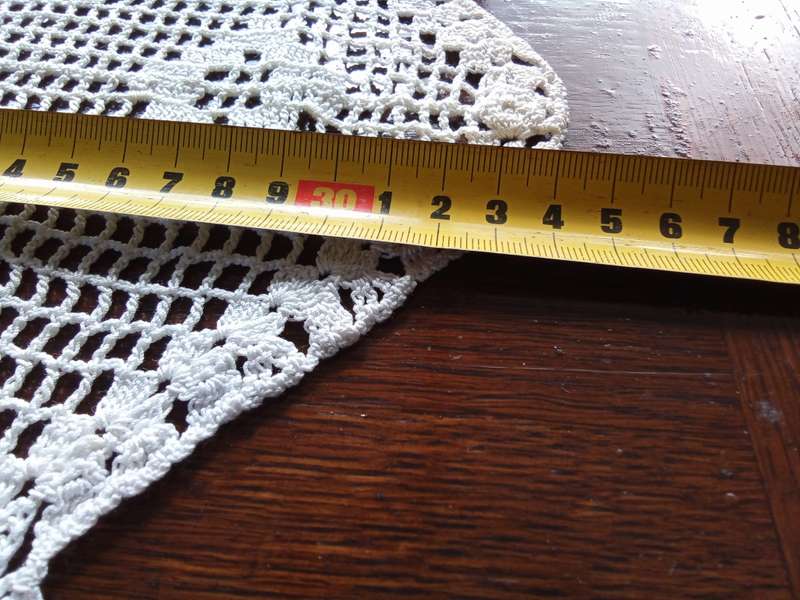Pretty and unusual vintage crocheted doily