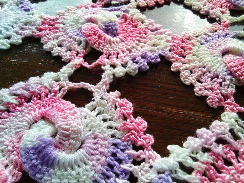 Very happy vintage crocheted tray cloth/doily