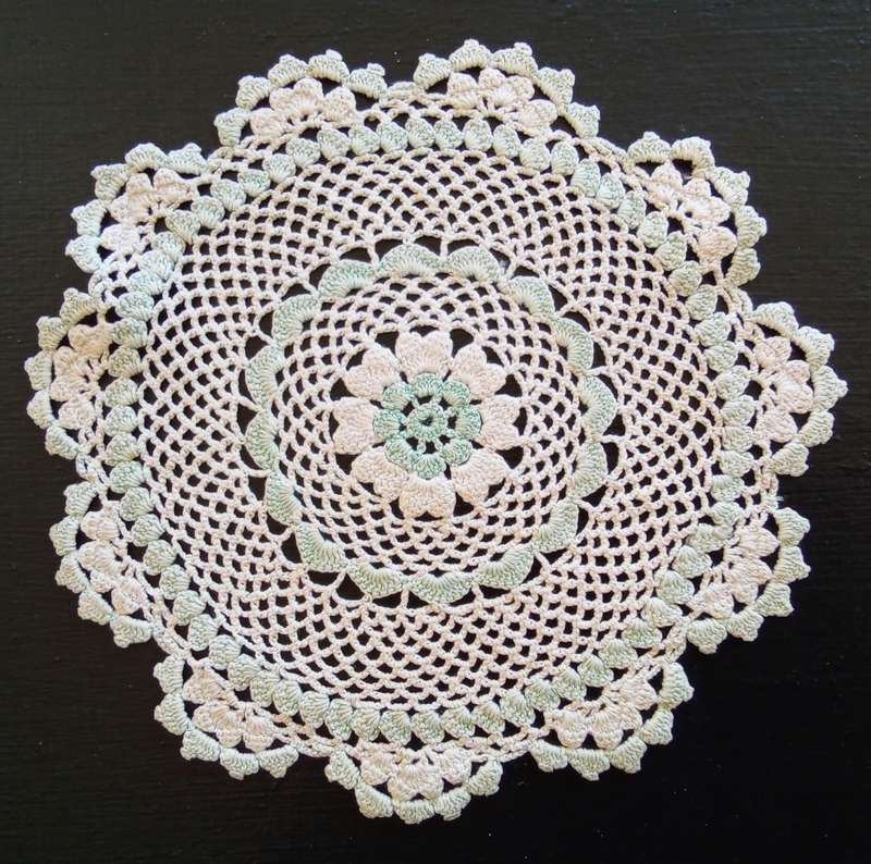 Pretty vintage crocheted doily with peppermint green