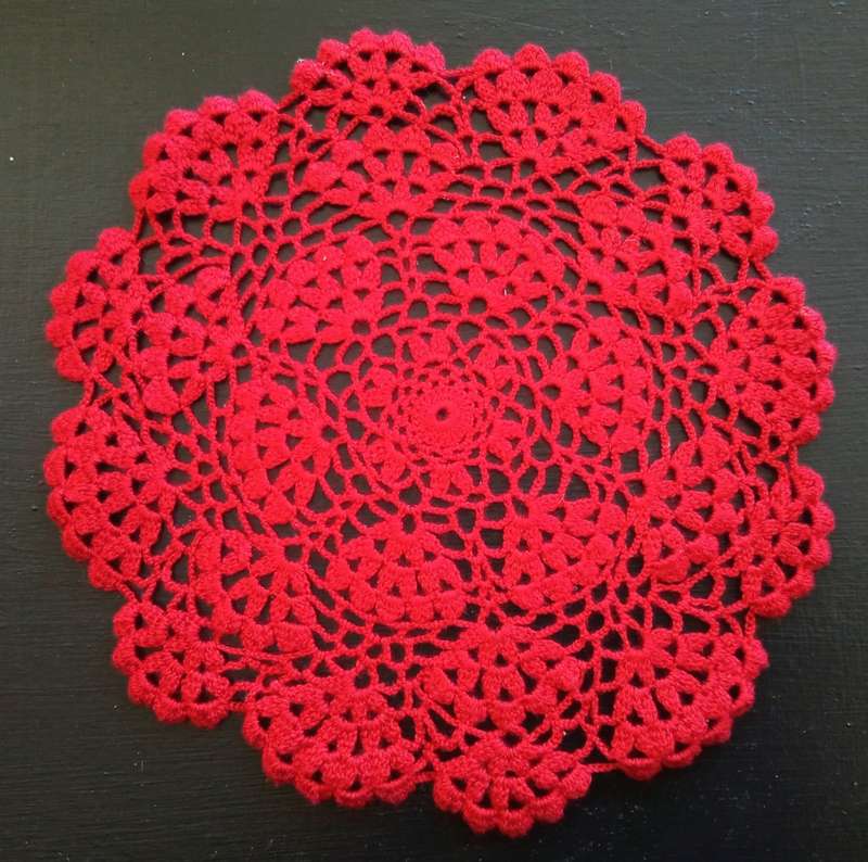Pretty red vintage crocheted doily