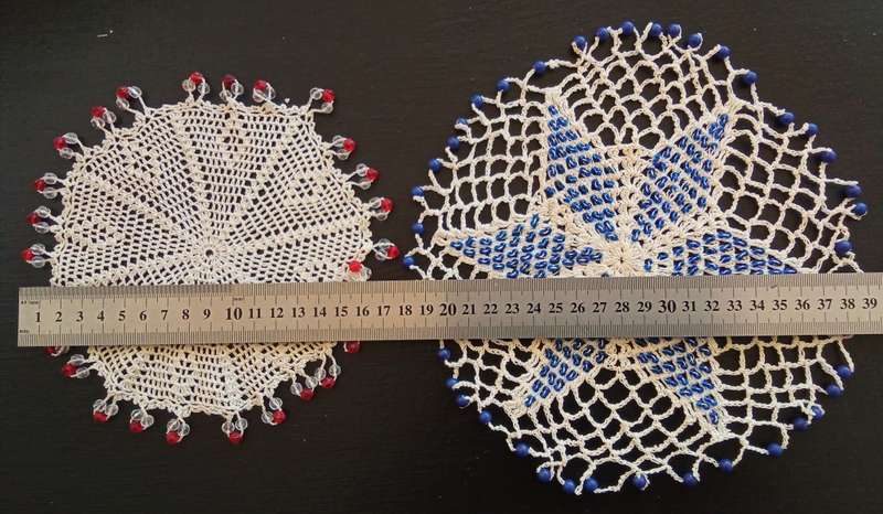 Two very pretty vintage crocheted beaded doilies