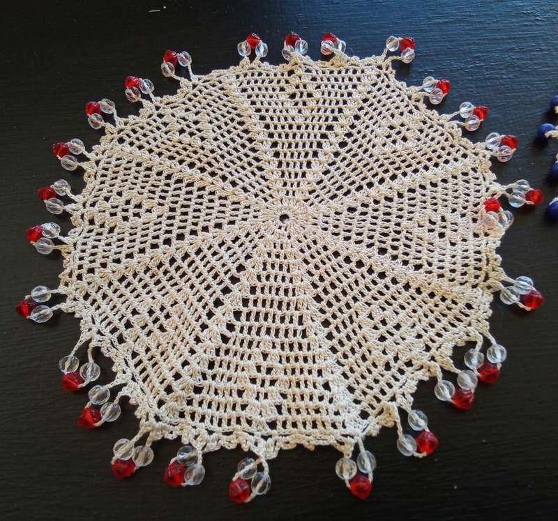 Two very pretty vintage crocheted beaded doilies