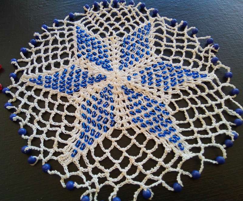 Two very pretty vintage crocheted beaded doilies
