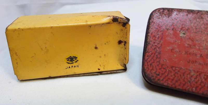 Two cute vintage tins