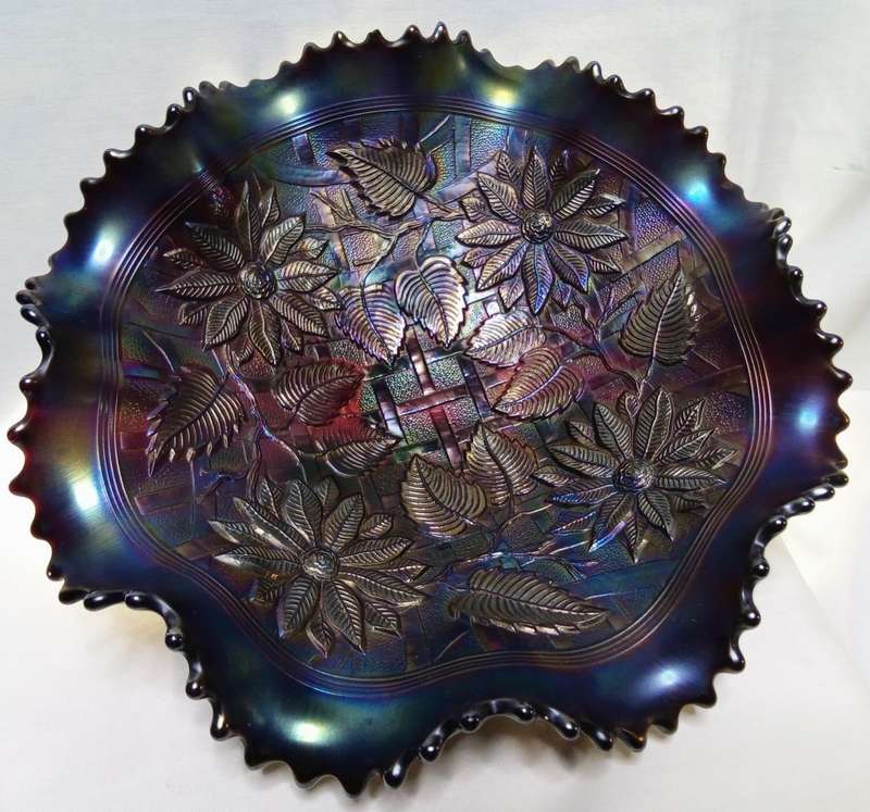 Northwood carnival glass Pointsettia and lattice electric blue footed bowl
