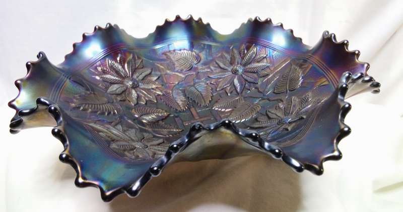 Northwood carnival glass Pointsettia and lattice electric blue footed bowl