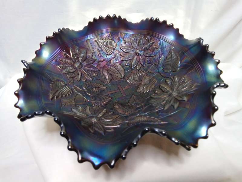 Northwood carnival glass Pointsettia and lattice electric blue footed bowl