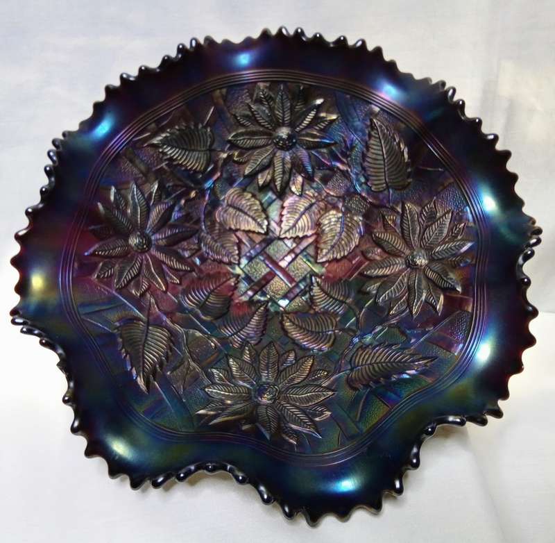 Northwood carnival glass Pointsettia and lattice electric blue footed bowl