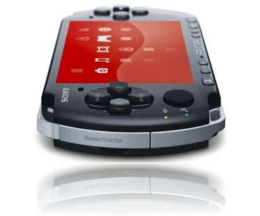 PSP SLIM & LITE 3004 PIANO BLACK FREE POSTAGE PLUS 10 GAMES!!!!!