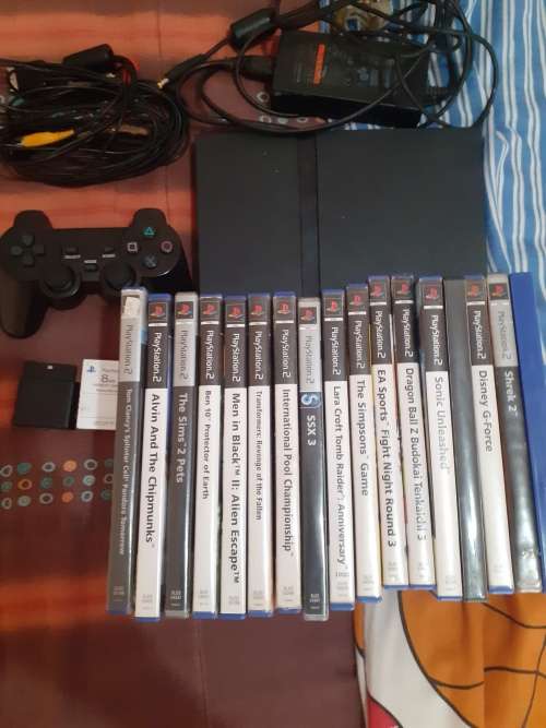 Playstation 2 with 20 games and an controller