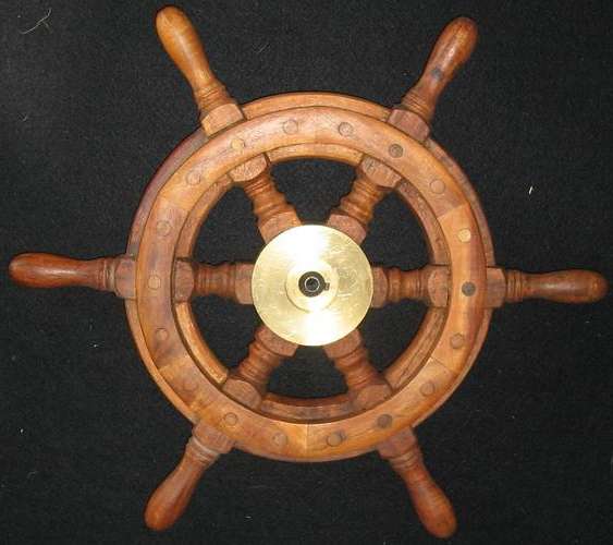 40cm Decorative wood and brass ships wheel.  Ideal for nautical centre piece