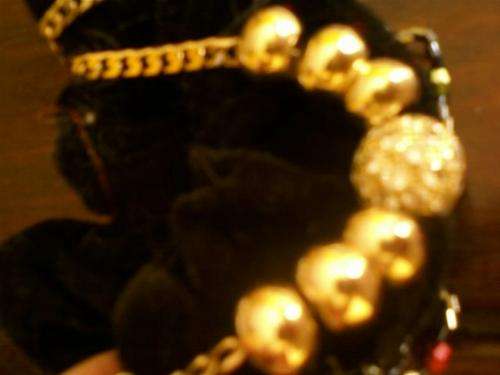 7 X 9CT GOLD FRIENDSHIP RINGS WITH 9CT GOLD GLITTER BALL