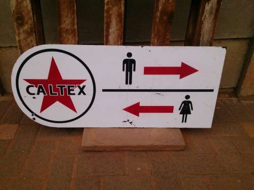 Steel Caltex Restroom Sign