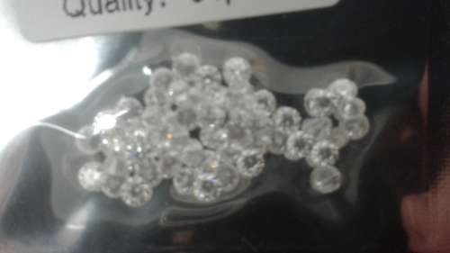 0.06ct Moissanite Top Range Forever Brilliant D White Color. 2.5mm Round Cut Accent side Stone VVS1.