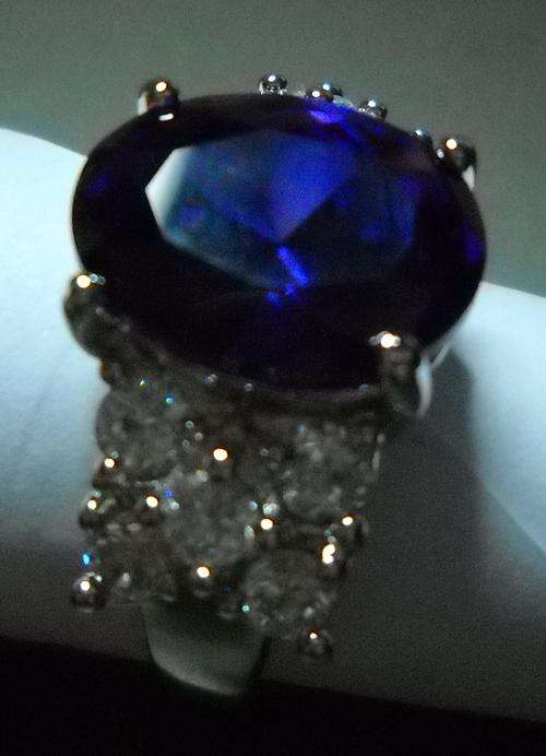 10x14mm TANZANITE & CZ SIMS SET IN 14kt WHITE GOLD PLATE RING. STUNNING
