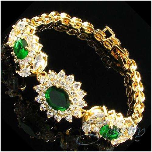 Green Emerald And White Topaz Oval Cut Set In 18k Yellow Gold Plated Tennis Bracelet