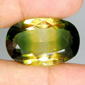 !!HUGE BI-COLOUR!! 26.67ct STUNNING NATURAL OVAL CUT BI COLOR AMETRINE.