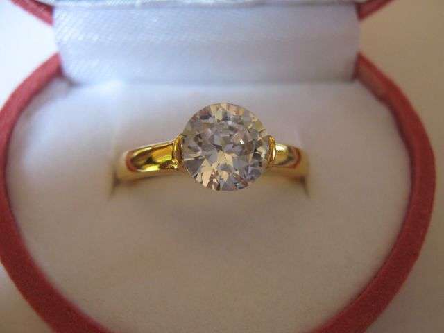 Size 6 1/2 - 1ct Round Brilliant Cut Solitaire Engagement Ring clad in 18K Yellow Gold!!