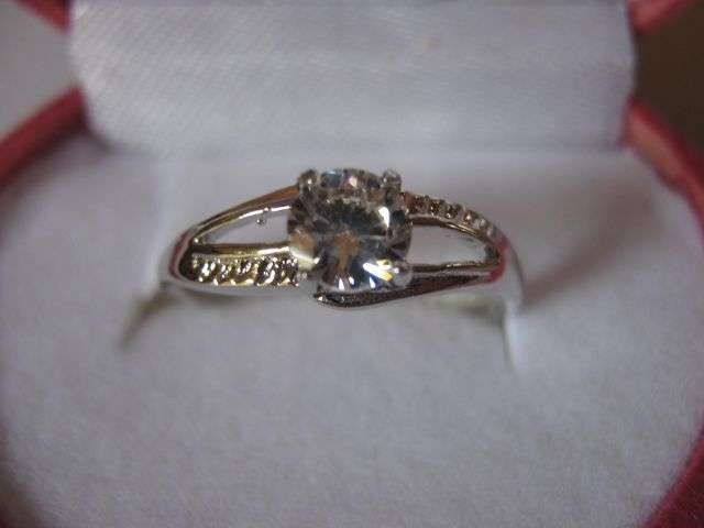 Size 7 1/2 - Really Nice!! Round Brilliant Cut Engagement Ring clad in 18K White Gold!!