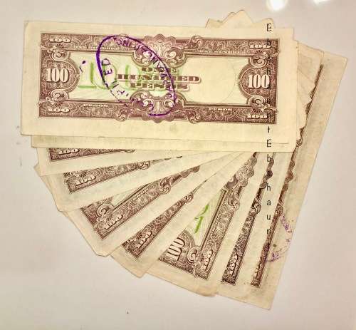 JAPAN 100 PESOS PHILIPPINES 1942  JAP OCCUPATION(STAMPED COMPIELD JAPWANCAP.INC)BID PER NOTE