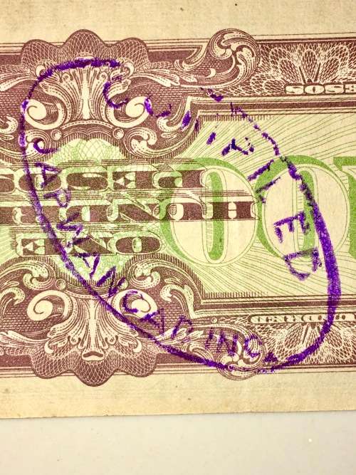JAPAN 100 PESOS PHILIPPINES 1942  JAP OCCUPATION(STAMPED COMPIELD JAPWANCAP.INC)BID PER NOTE