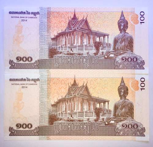 CAMBODIA 100 RIELS IN SEQ 9888641-642 UNC GEM 2014 IN PLASTIC INFO SLEEVE(1 BID TAKES ALL)