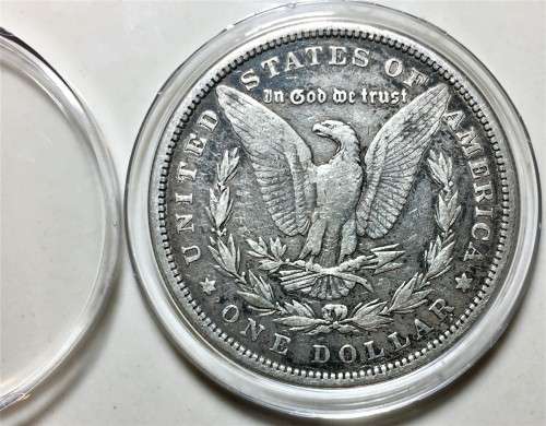 U S A SILVER MORGAN DOLLAR 1879-(142 YEARS OLD)PHILADELPHIA MINT GOOD CONDITION WITH CAPSULE