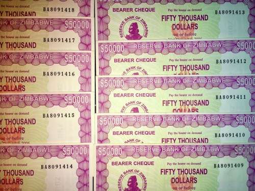 ZIMBABWE $50,000 IN SEQUENCE BA8091418-409 UNC FIFTY THOUSAND DOLLARS 2006(1 BID TAKES ALL)