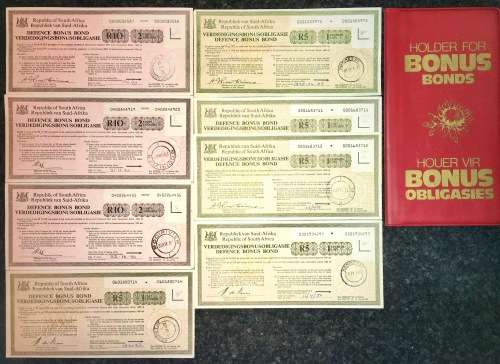 S.A DEFENCE FORCE BONUS BONDS SET WITH ORIGANAL HOLDER R10 X 3 & 5 X R5 FROM 1978-1982(1 BID TAKE AL