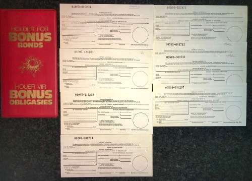 S.A DEFENCE FORCE BONUS BONDS SET WITH ORIGANAL HOLDER R10 X 3 & 5 X R5 FROM 1978-1982(1 BID TAKE AL