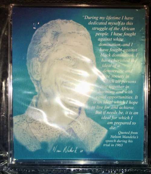 MANDELA COMMEMORATIVE R5 --STILL SEALED MANDELA 2000 PROOF LIKE COIN IN MANDELA CD COVER
