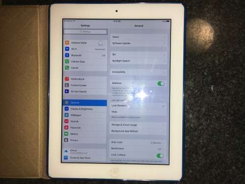 APPLE IPAD 3 -- 64G MODEL  A1430 WORKING 100% TAKES SIM,WITH CHARGER AND LEATHER COVER