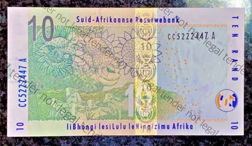 GILL MARCUS ERROR R10 OFF CENTER INCL STRIP UNC 1ST ISSUE 2009(RHINO WATERMARK) (1 BID TAKES ALL)