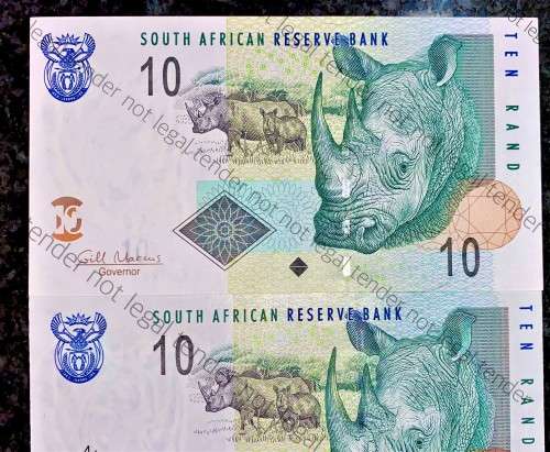 GILL MARCUS ERROR R10 OFF CENTER INCL STRIP UNC 1ST ISSUE 2009(RHINO WATERMARK) (1 BID TAKES ALL)
