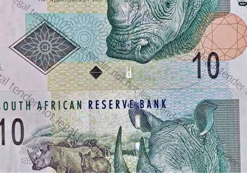 GILL MARCUS ERROR R10 OFF CENTER INCL STRIP UNC 1ST ISSUE 2009(RHINO WATERMARK) (1 BID TAKES ALL)