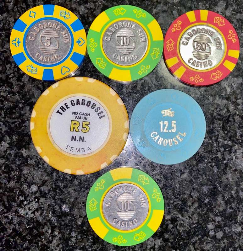 CASINO CHIPS CAROUSEL SET R5 & R12.50 AND GABORONE SET 5 - 10 & 50 ( 1 BID TAKES ALL)