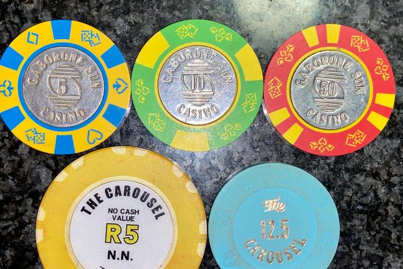 CASINO CHIPS CAROUSEL SET R5 & R12.50 AND GABORONE SET 5 - 10 & 50 ( 1 BID TAKES ALL)