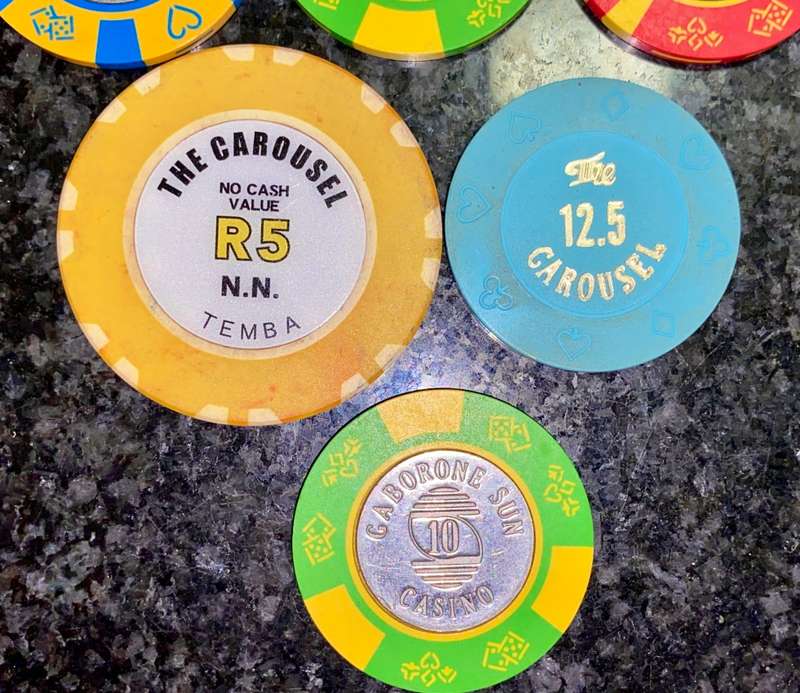 CASINO CHIPS CAROUSEL SET R5 & R12.50 AND GABORONE SET 5 - 10 & 50 ( 1 BID TAKES ALL)