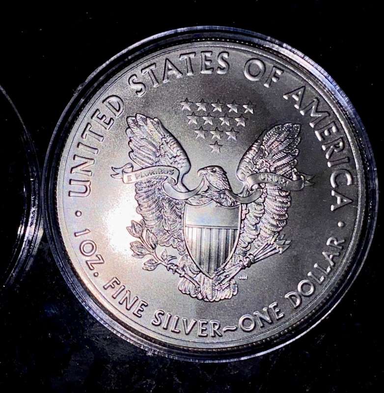 U S A - 1OZ SILVER AMERICAN EAGLE DOLLAR 1990 LIBERTY BU  .999 SILVER IN CAPSULE