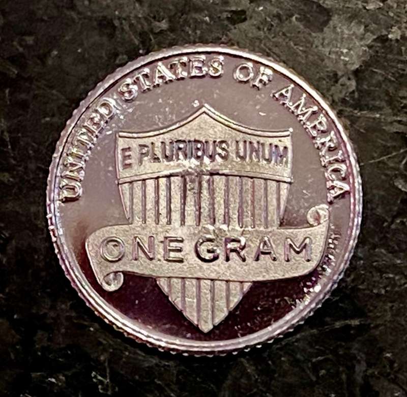 U S A -- SHIELD PENNY -- LINCOLN - IN GOD WE TRUST - 1 GRAM FINE SILVER - 99,99 SILVER ROUND